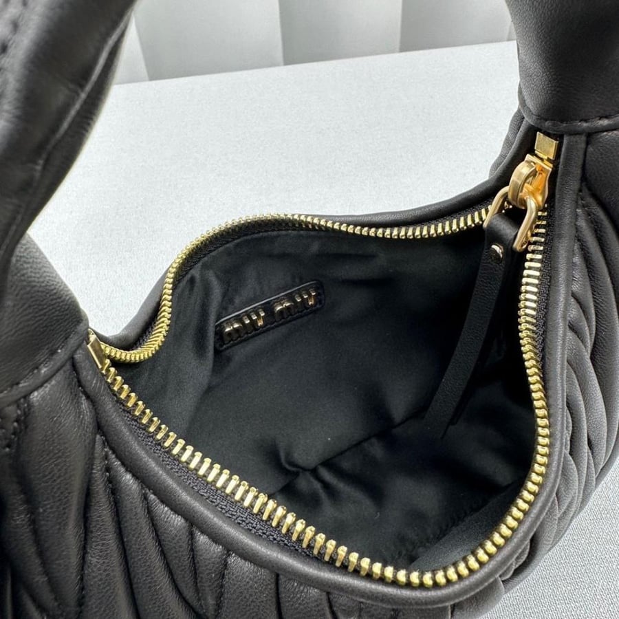 Wander matelassé nappa leather hobo bag