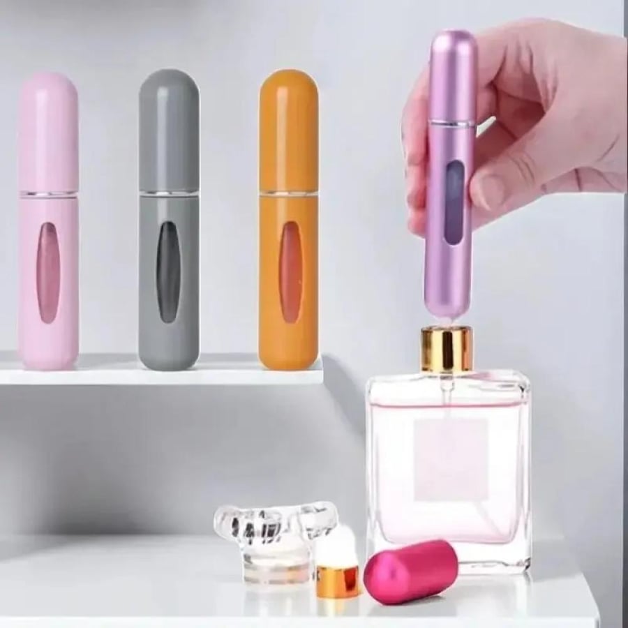 Portable refillable perfume container