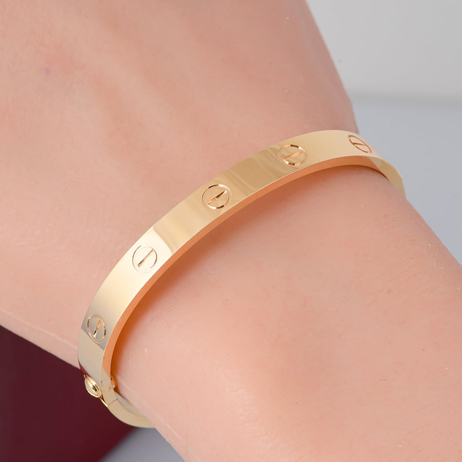 إسوارة كارتير Cartier LOVE الكلاسيكية من الذهب الأصفر الخالص - رمز الحب الخالد