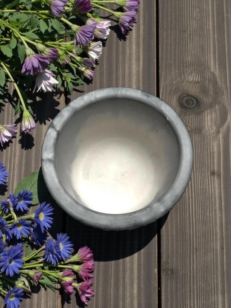 A multi-purpose container or (flowerpot).