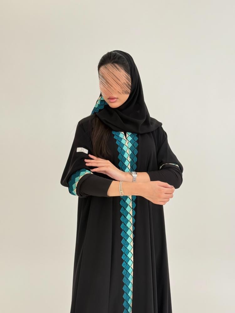 عباية فرحه بقماش انترنت بتطريز تركوازي