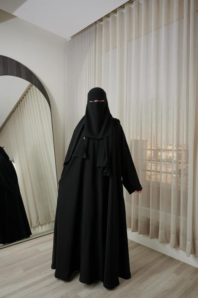 عباية كلوش بجيوب مخفية (قماش نواعم)