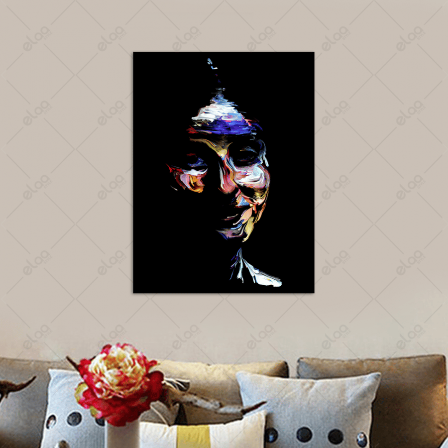 Abstract art painting of a woman's face in multiple colors