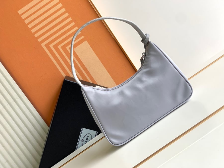 Prada logo-plaque mini bag