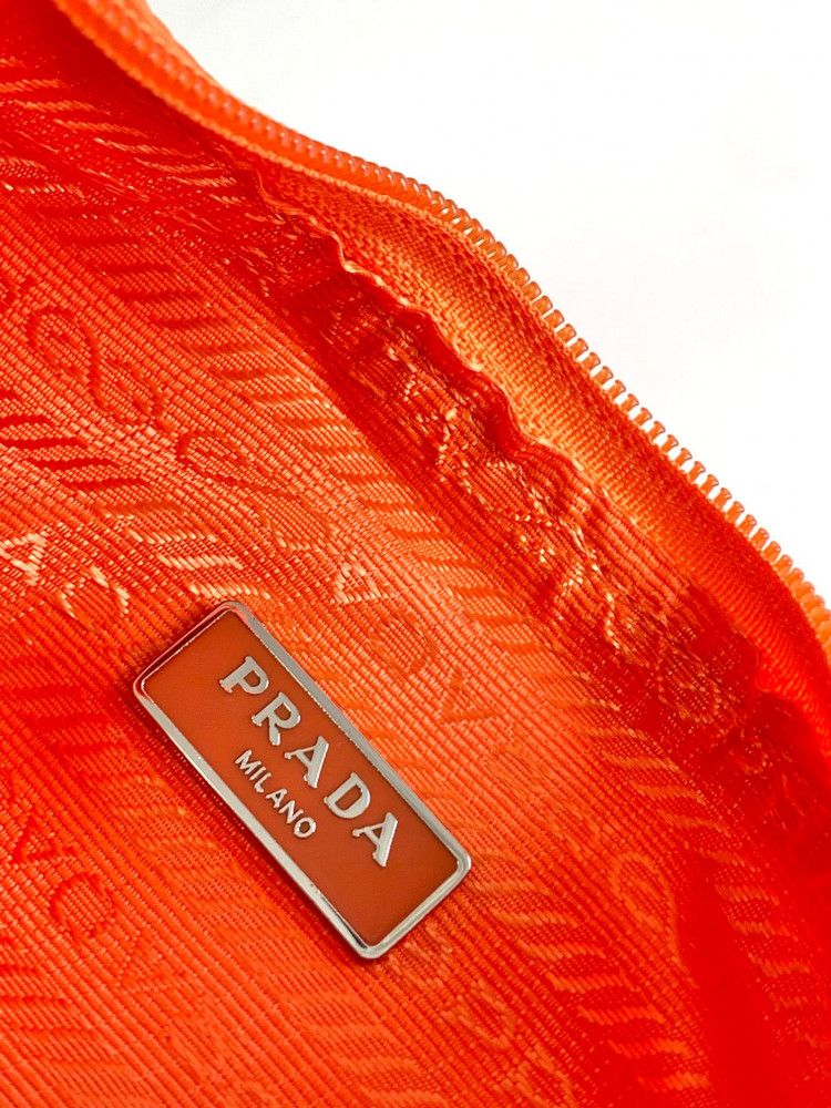 Prada logo-plaque mini bag