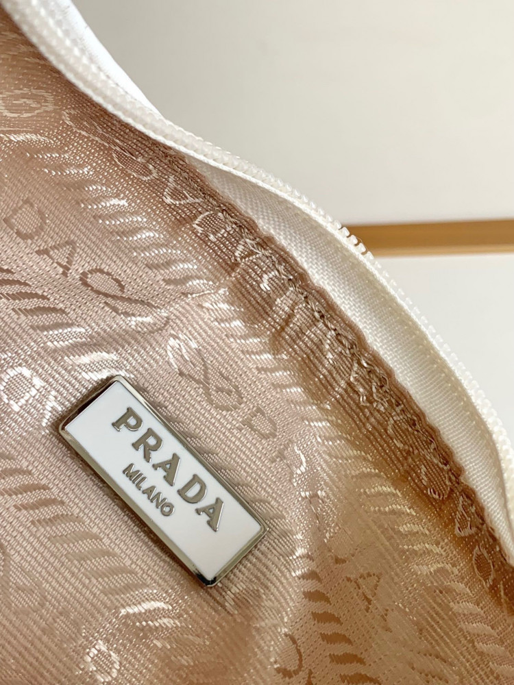 Prada logo-plaque mini bag