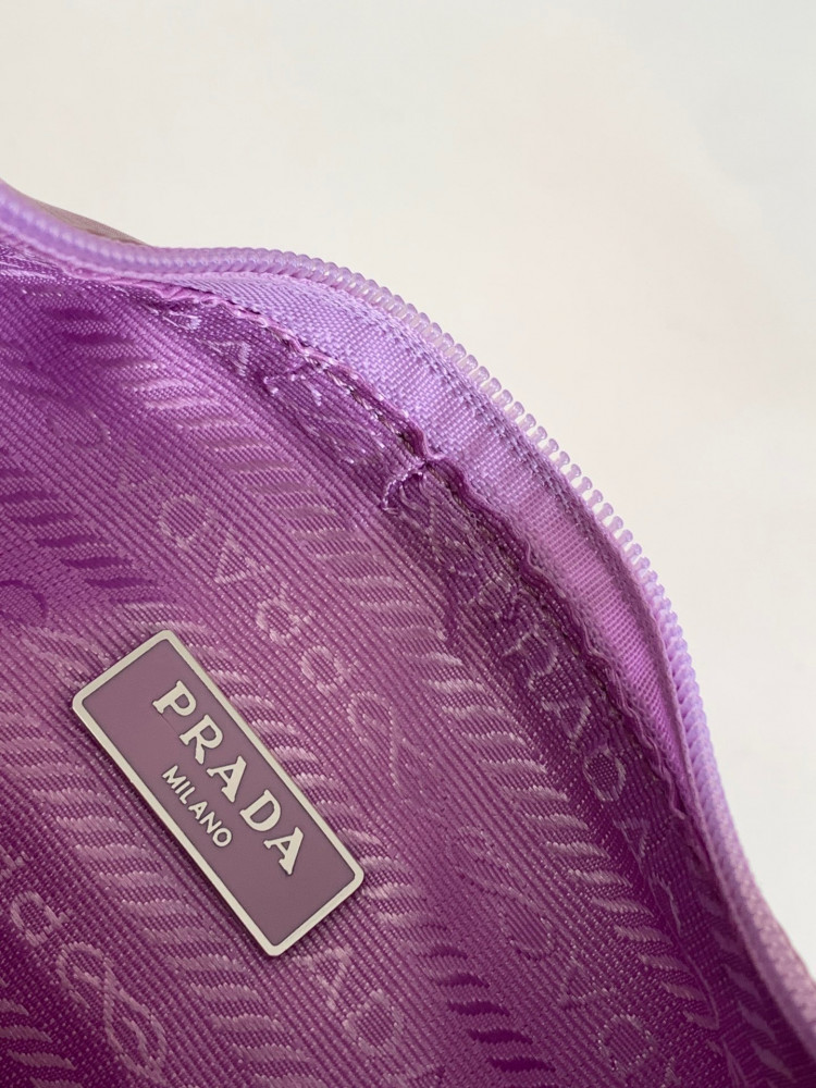 Prada logo-plaque mini bag