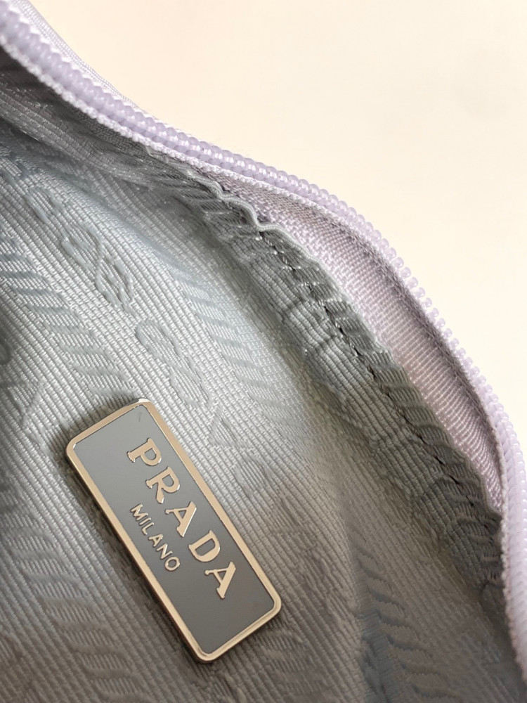 Prada logo-plaque mini bag