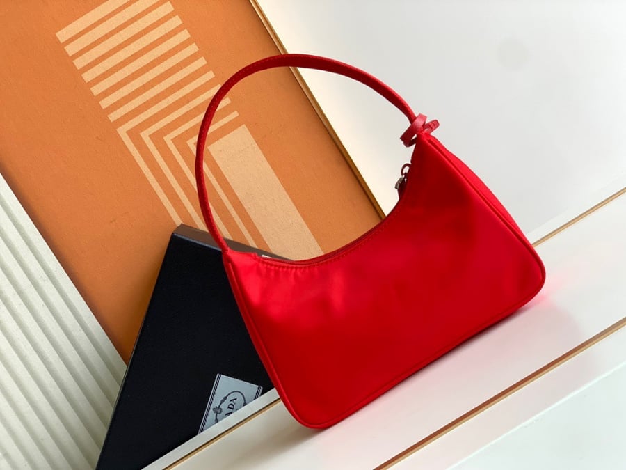 Prada logo-plaque mini bag