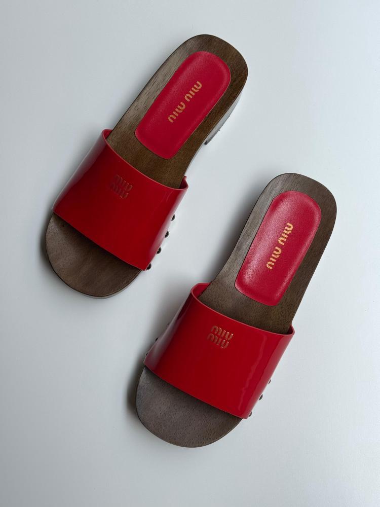 Patent leather clogs