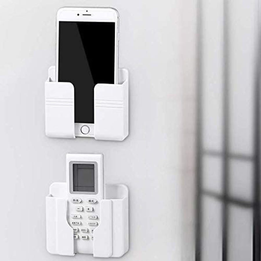 Wall-mounted phone holder with adhesive