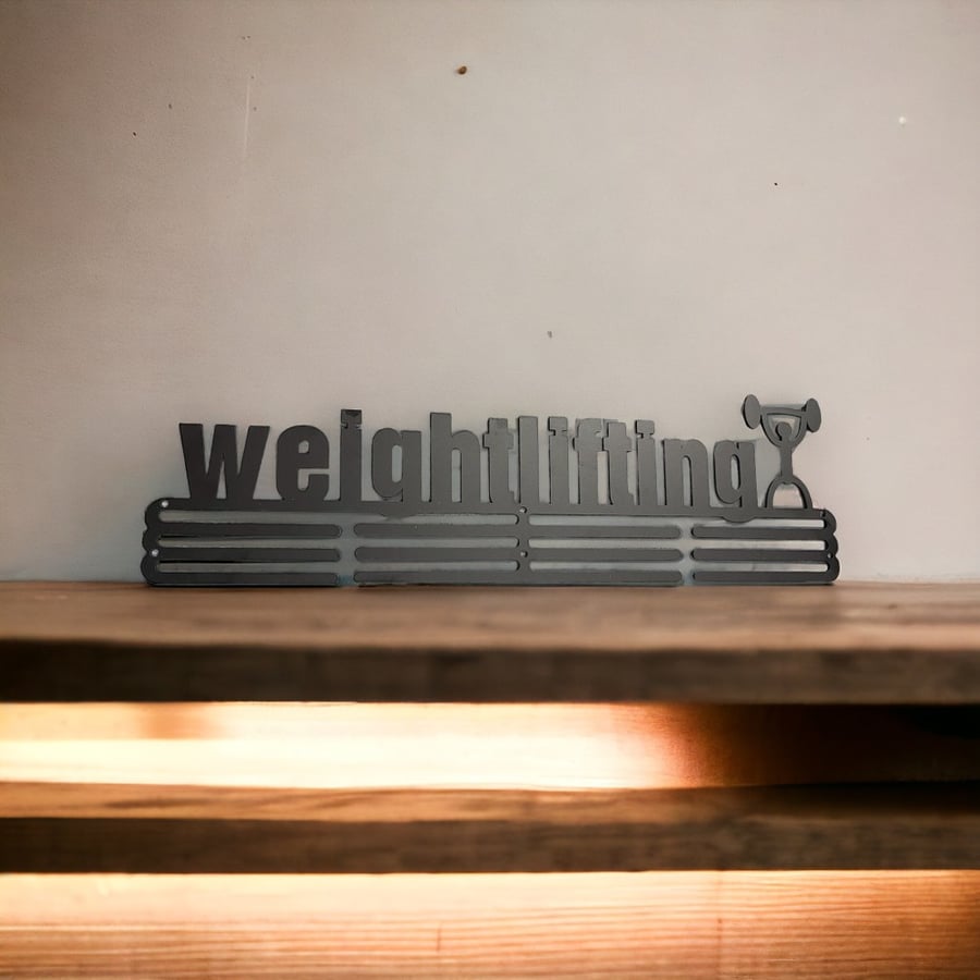 علاقة ميداليات شعار weightlifting