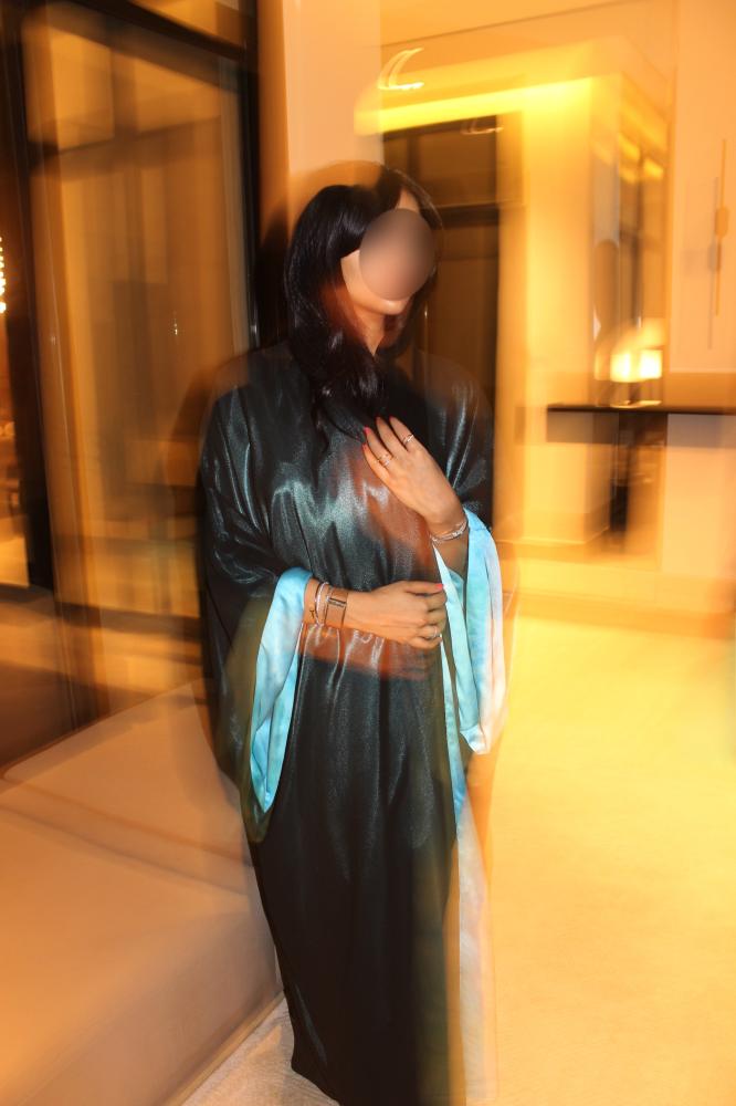 Textured turquoise silk with a black chiffon overlay in blended blue shades.
