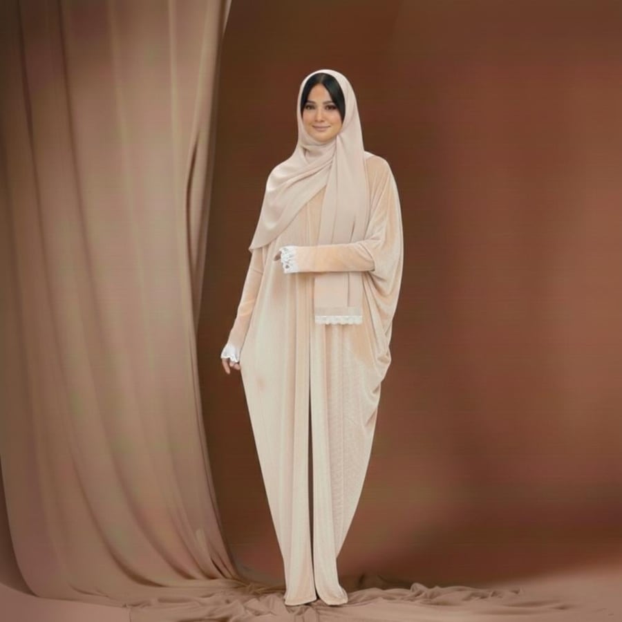 Beige velvet abaya with thumb-hole sleeves and white lace cuffs