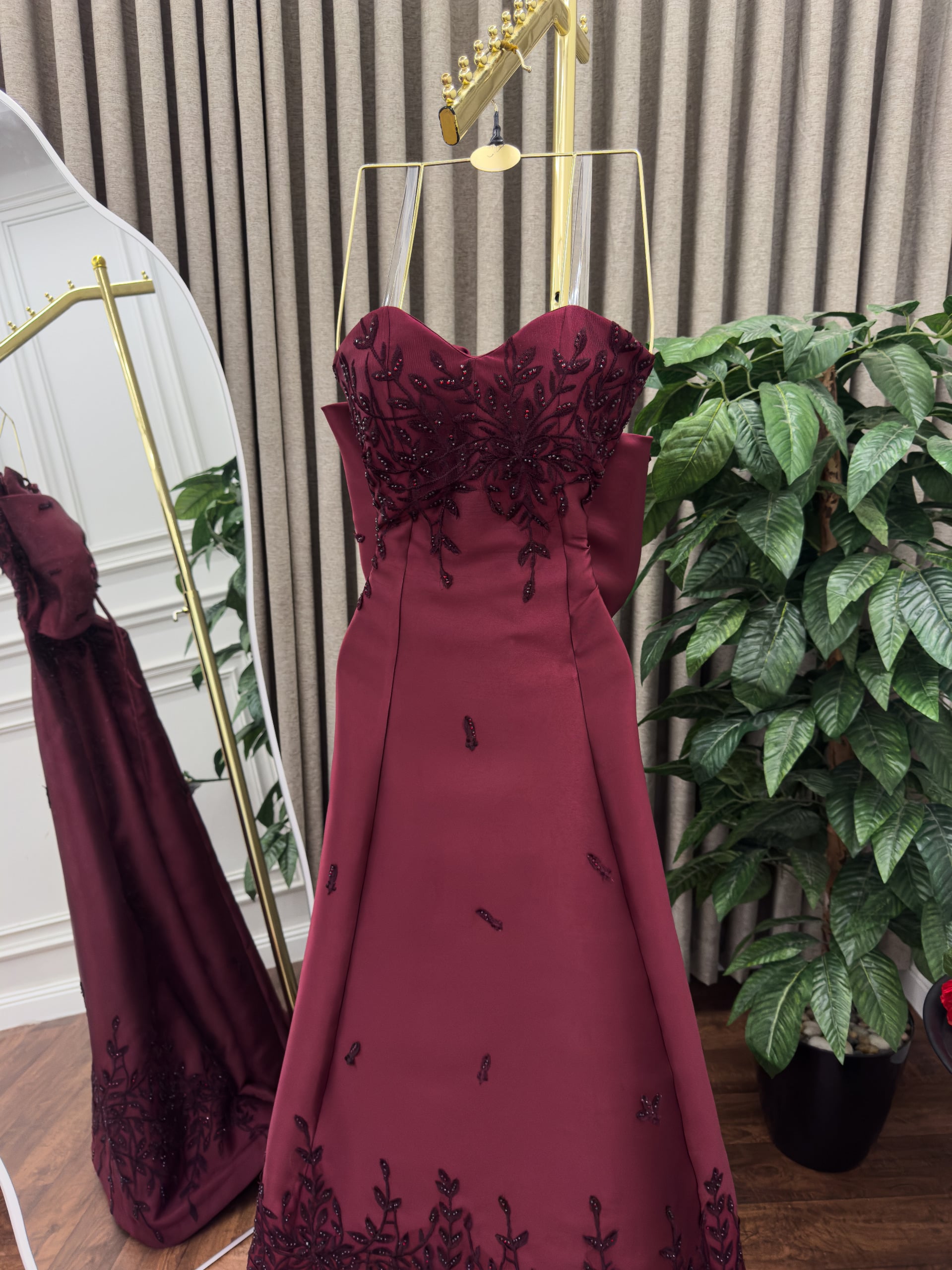 Elegant evening dress in aubergine color