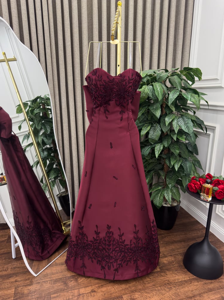 Elegant evening dress in aubergine color