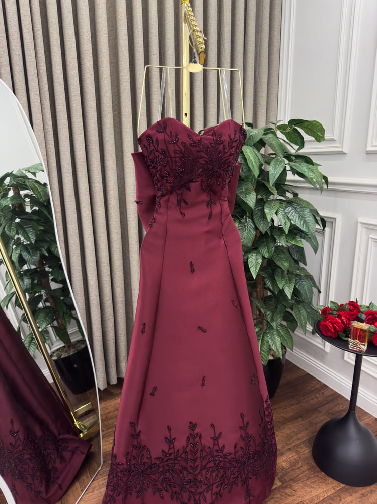 Elegant evening dress in aubergine color