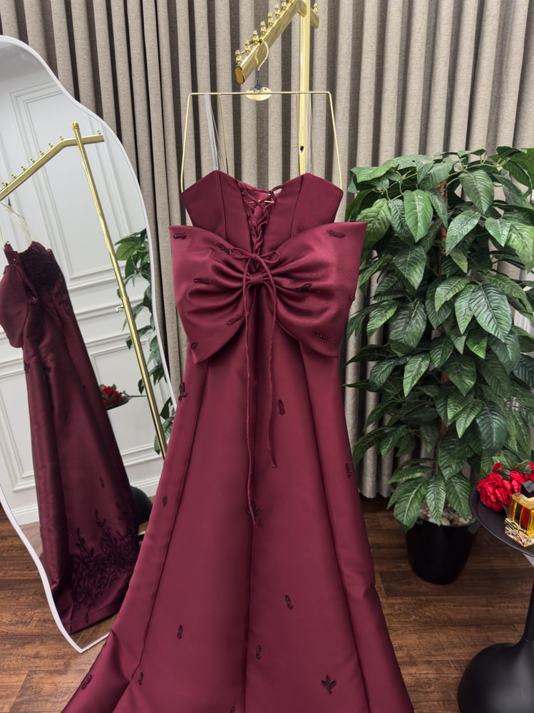 Elegant evening dress in aubergine color