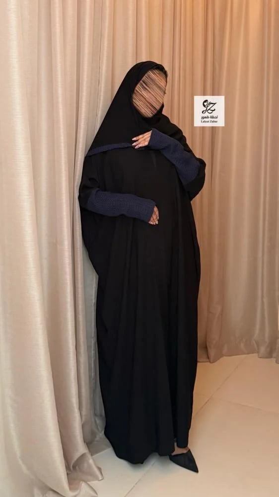 عبايه ابهار نص بشت بقماش ملكي بتدخيل تريكو كحلي
