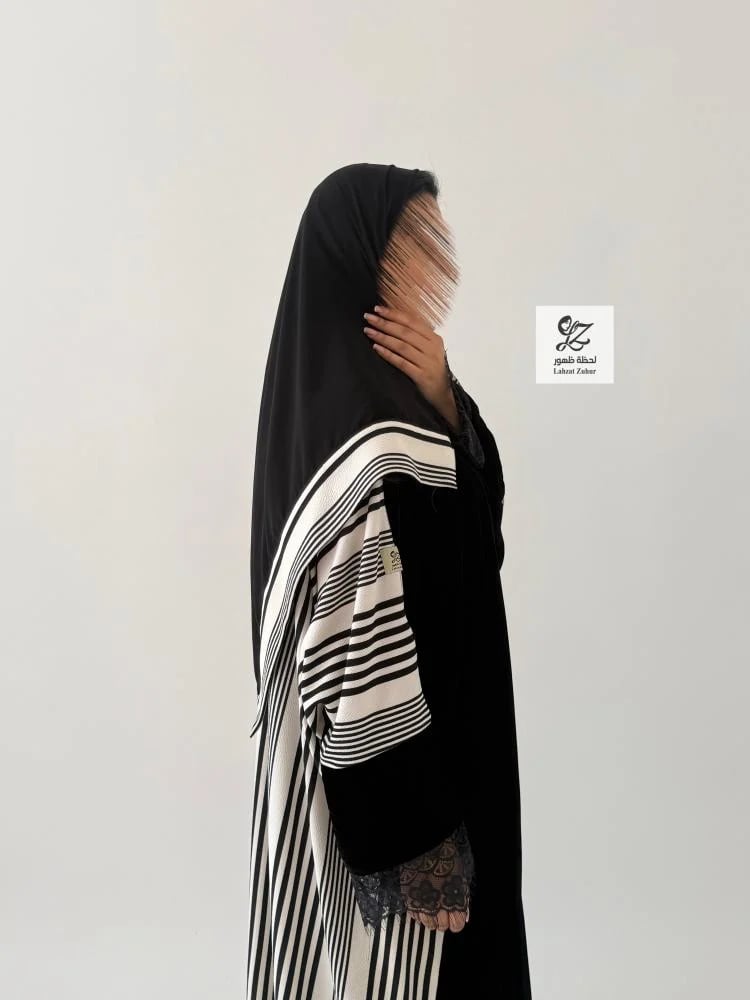 عباية غزلام بقماش مخمل كوري بتدخيل تريكو مخطط