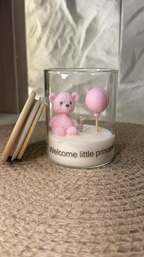 Pink-colored birthday candle
