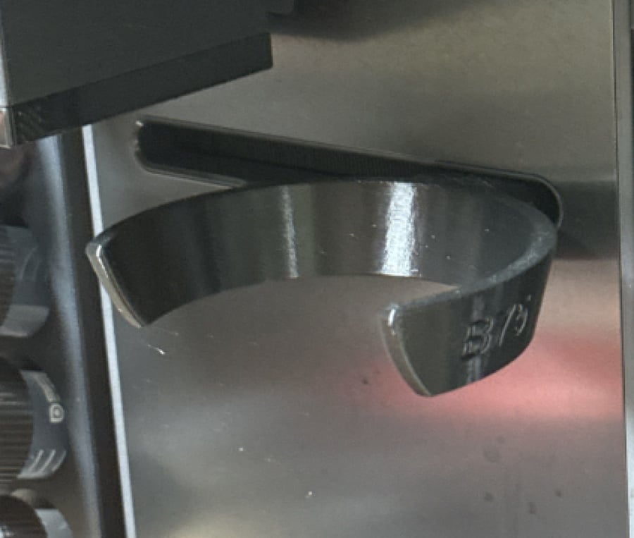 Holder for B75 X bloom suppressor