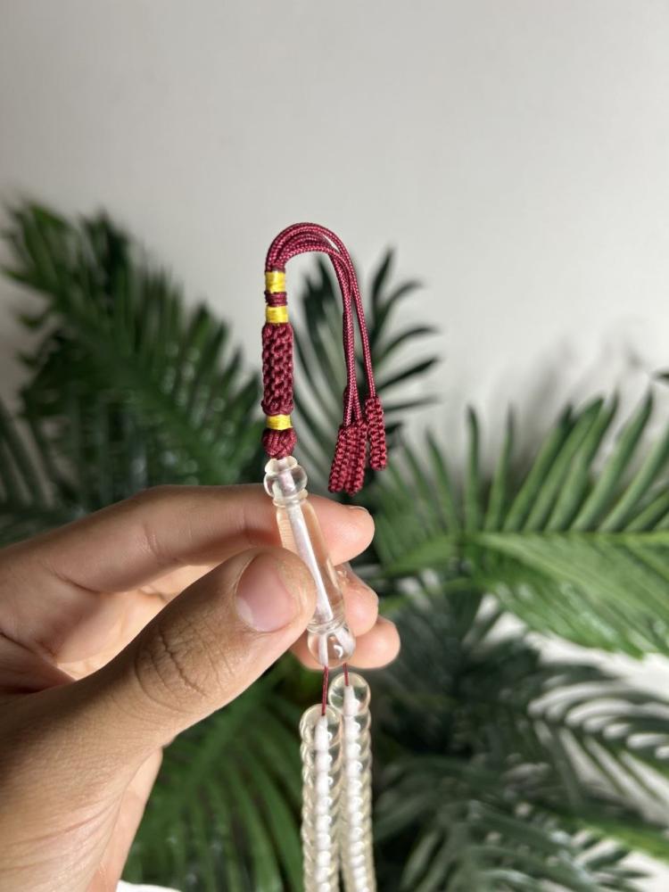 سبحة بكلايت لون ابيض حواف فضية كركوشة عنابي