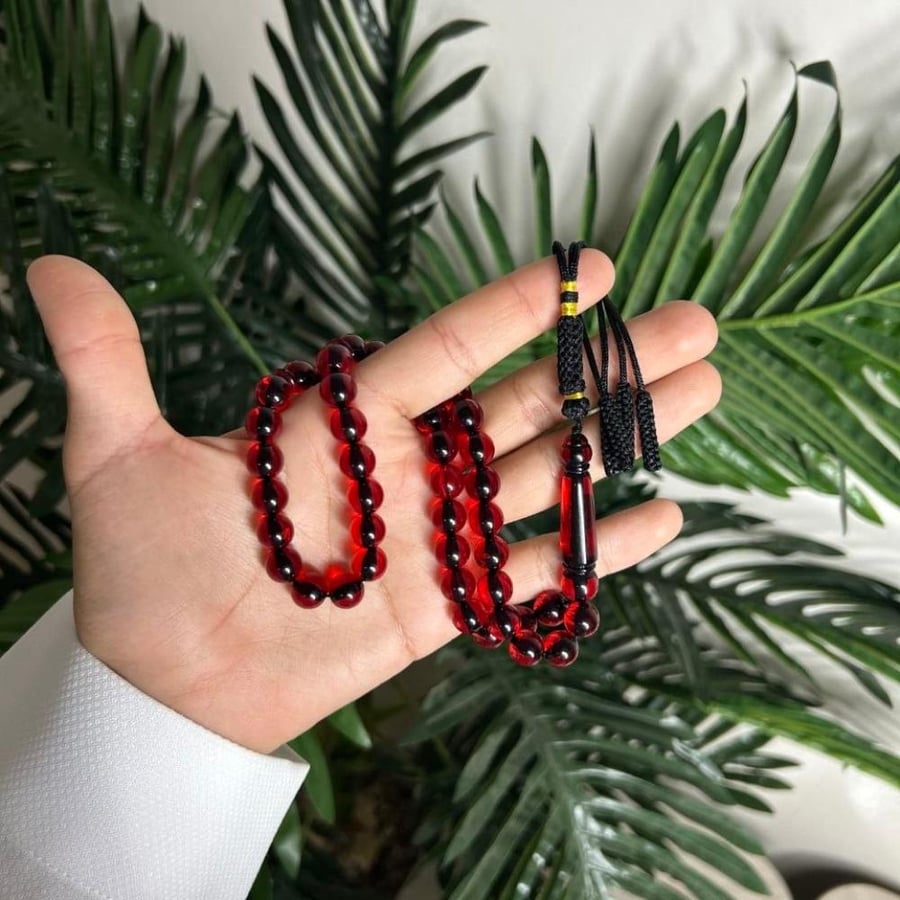 سبحة بكلايت لون عنابي شفاف كركوشة سوده