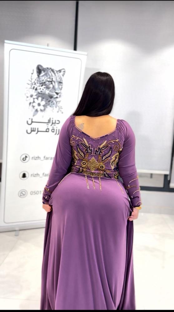 فستان كلوش شك بنفسجي فاتح