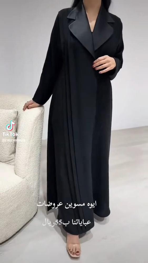 عبايه بكسرات أنيقة بخامة كريب وياقة ستان