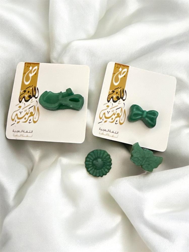 Arabic language themed distributions with (soap or candle or incense)
