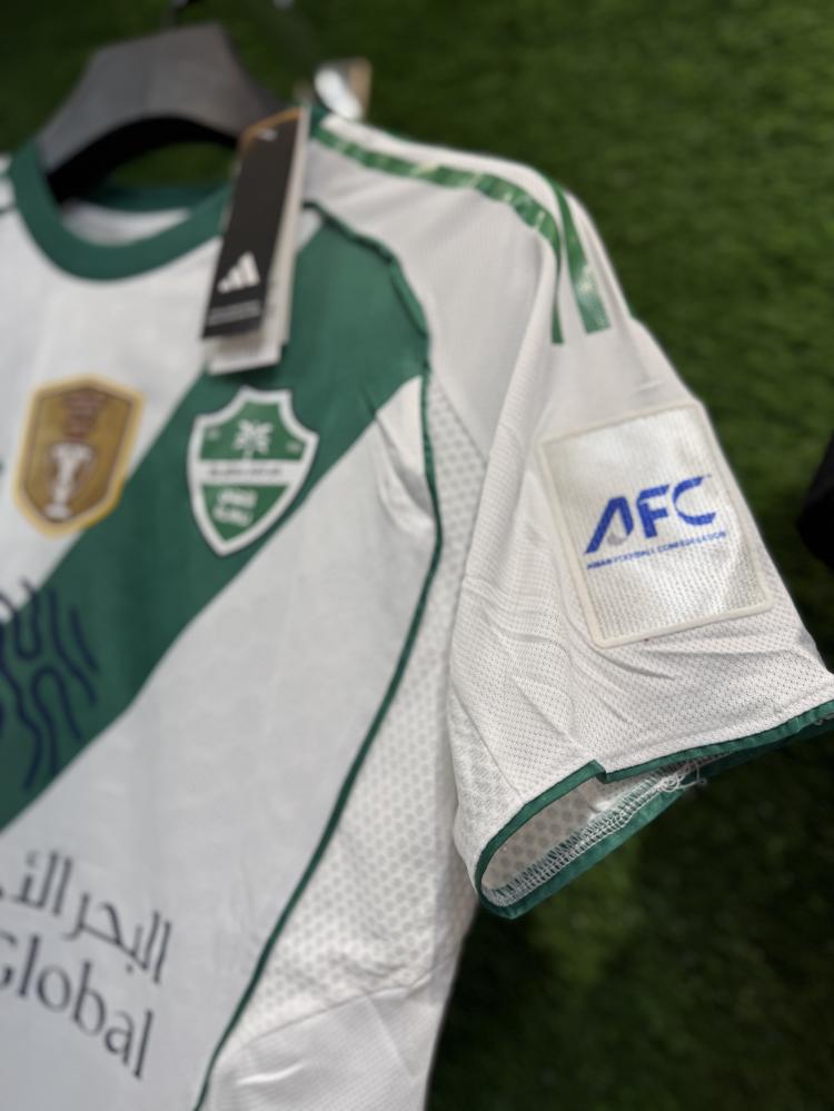 تيشيرت الاهلي الاساسي مع شعارات ( النخبة )