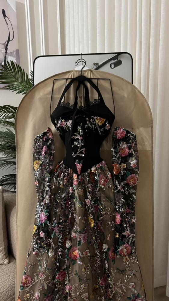 Black evening dress, material, international design, produced by the first factory with our exclusive and most distinguished materials, roses, and thank you, with additional separate sleeves.