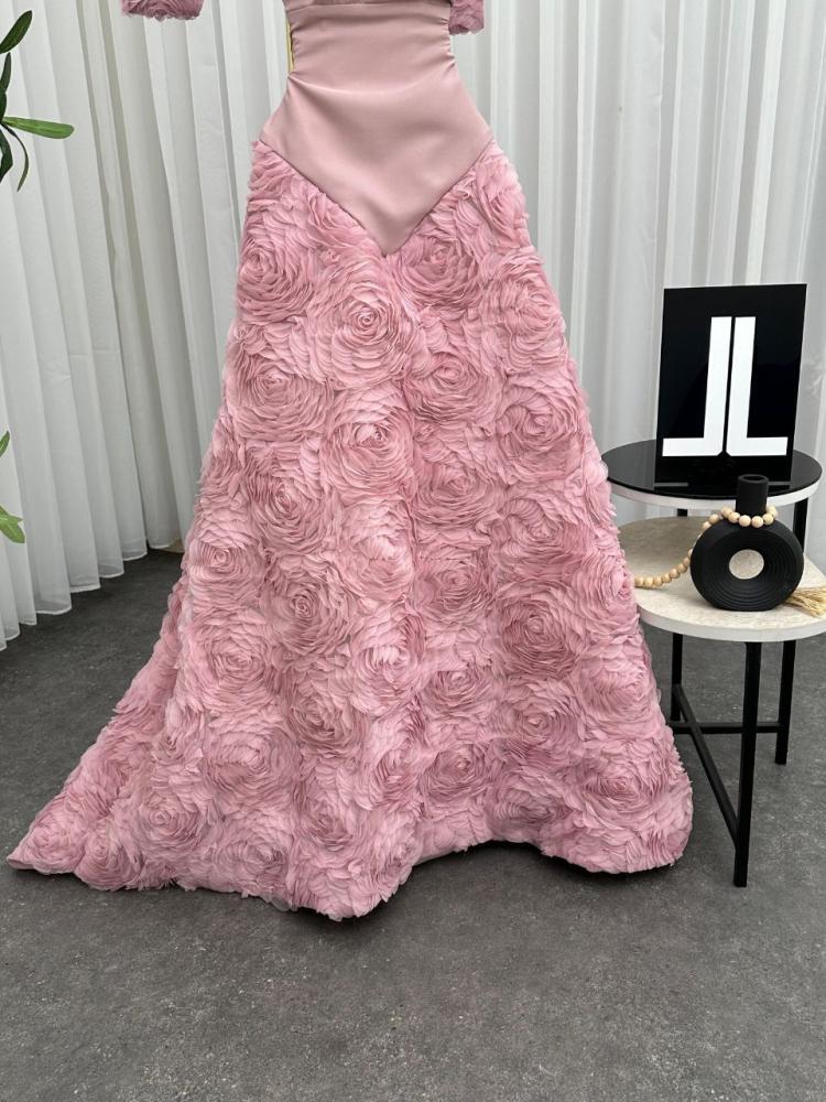 Pink evening dress with a dress cut made of flower fabric