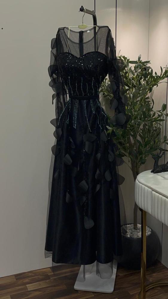 Black evening dress, raw material, embroidered tulle, and beads