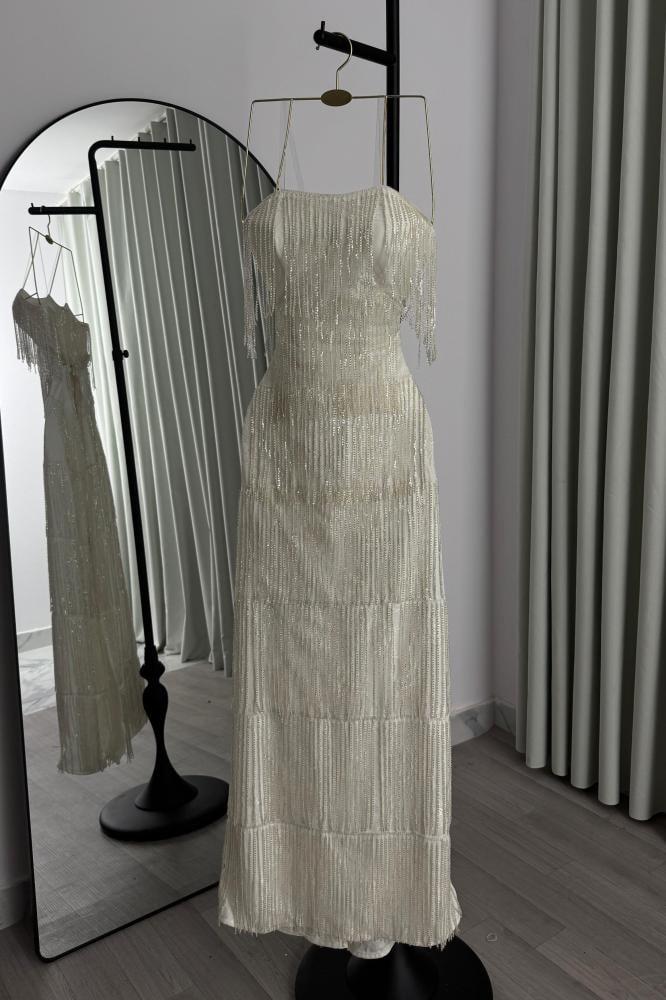 Evening dress beige material with bead fringe + lace lining torn