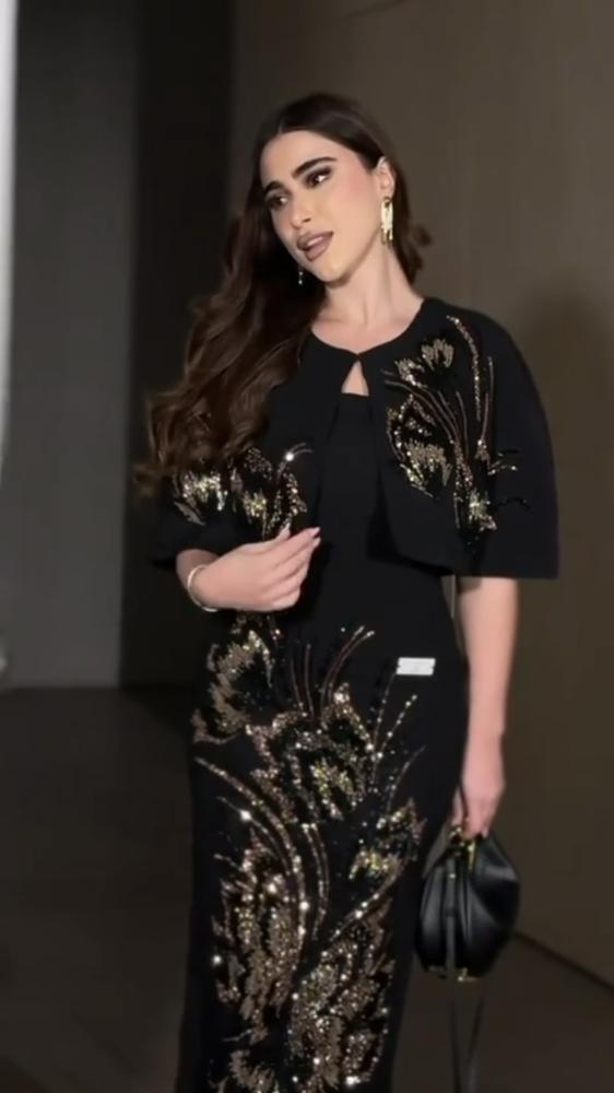 Black evening dress, fabric is barli, embroidered decoration
