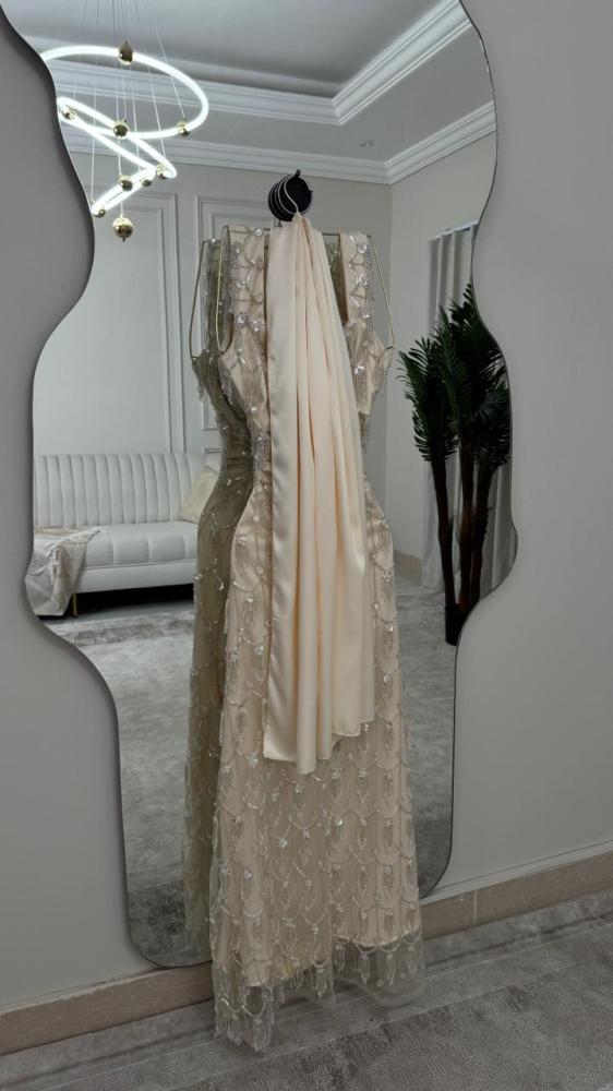 Evening dress gold fabric embroidered with beads