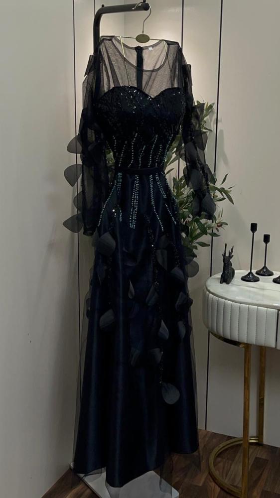Black evening dress, raw material, embroidered tulle, and beads