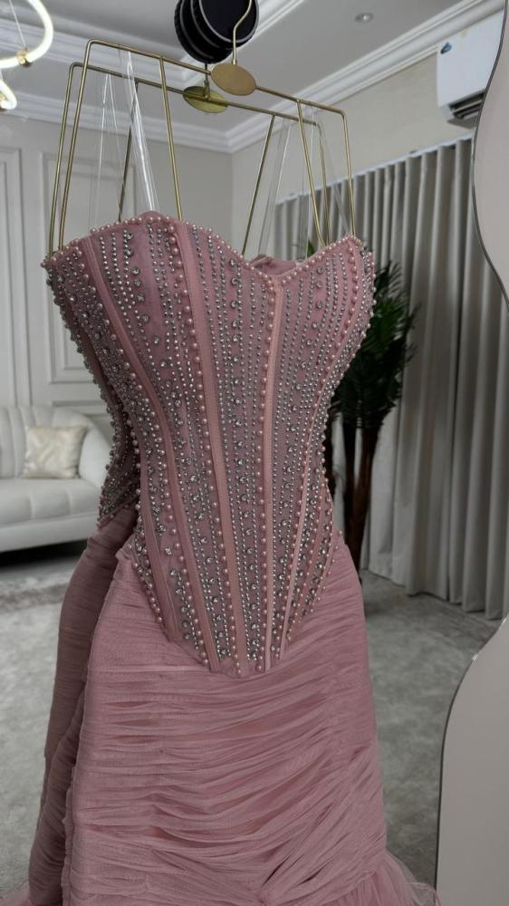 Evening dress pink tulle in a set and there is a dress of it