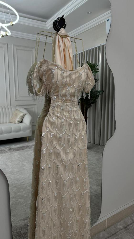 Evening dress gold fabric embroidered with beads