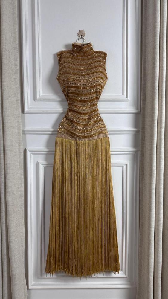 Evening dress gold material embroidery hand + fringe lining tear