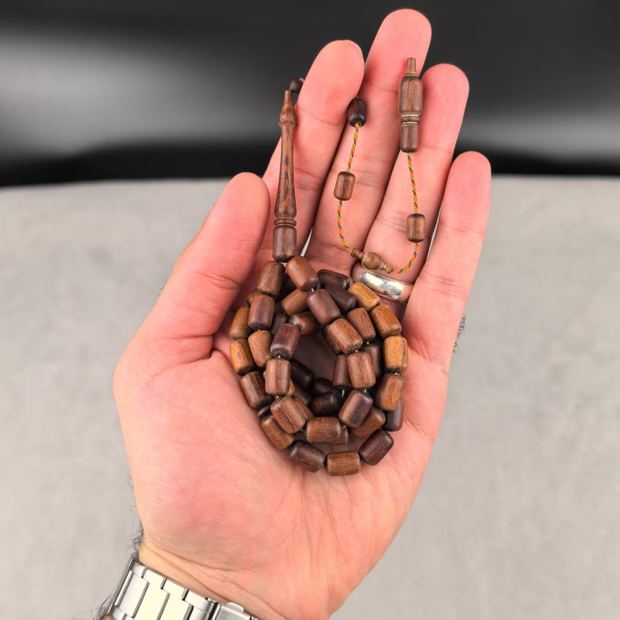 مسباح خشب الحية