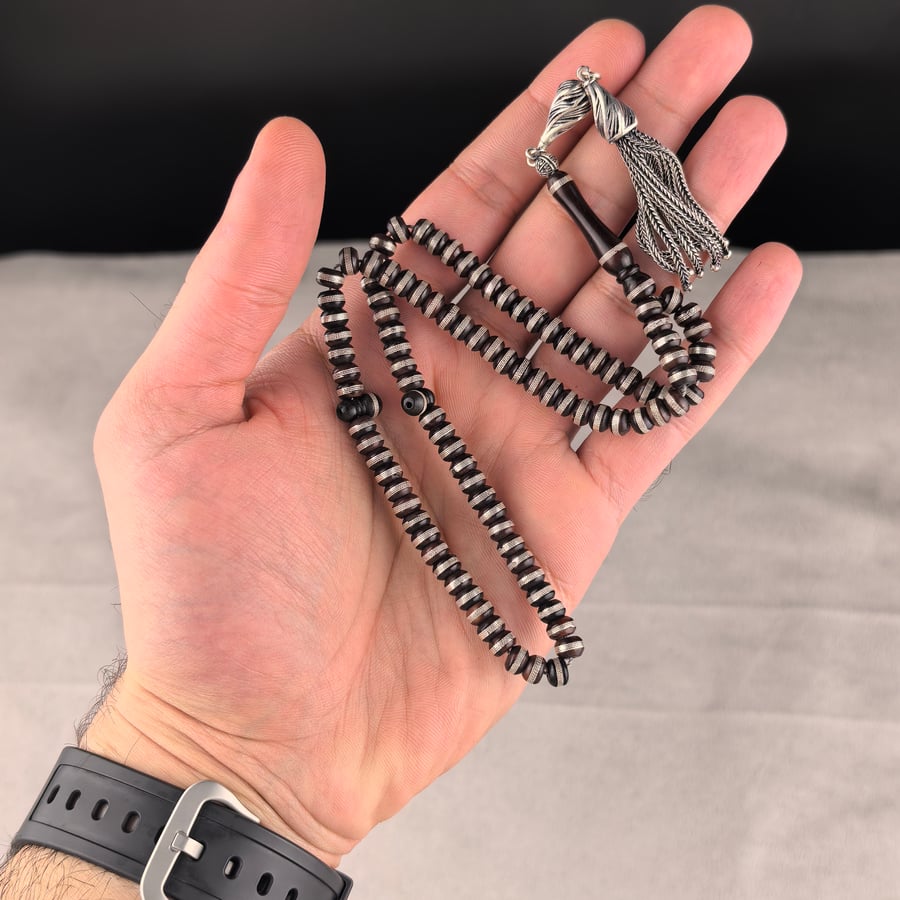 مسباح كوك بالفضة 99