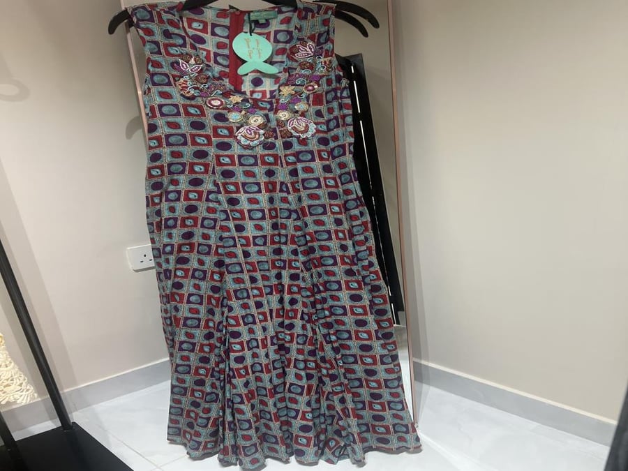 Cotton floral dress with embroidered chest without sleeves