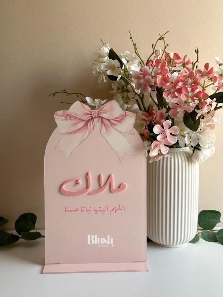 Acrylic table stand for name / with bow theme and raised acrylic lettering