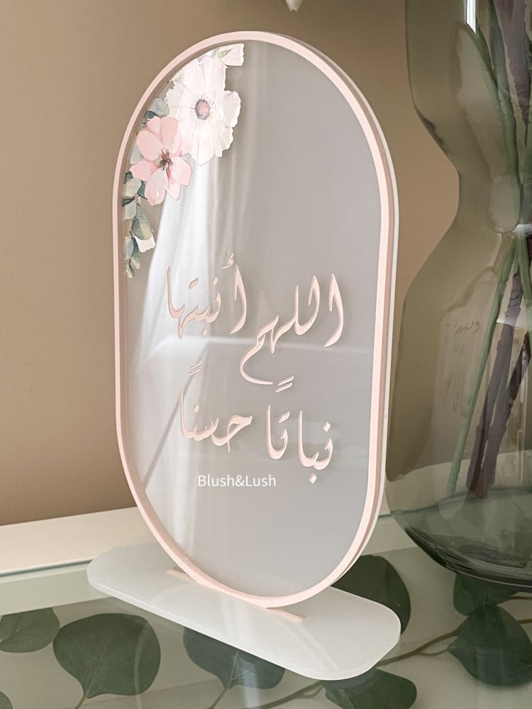 Ice-white oval acrylic table stand with pink rose design