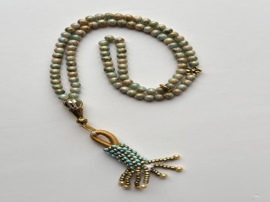 Gold prayer beads
