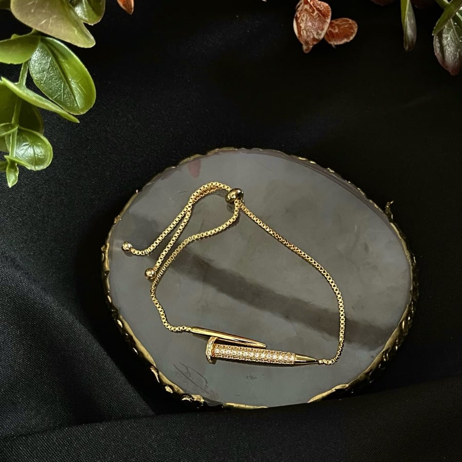 إسواره ذهبي تصميم ( Cartier )