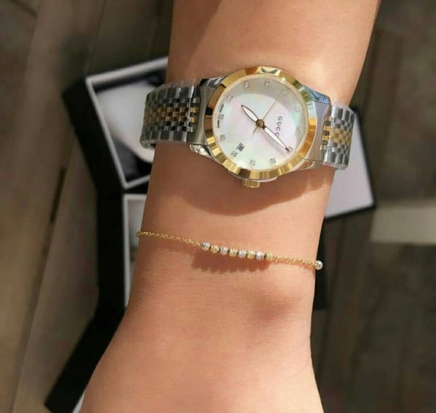 ساعه قوتشي مينا صدفي وقطع الماس نسائي مقاس المينا28mm